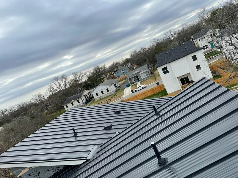 Standing seam metal roof panels with vents for Skylight Repair in Lakeland Village